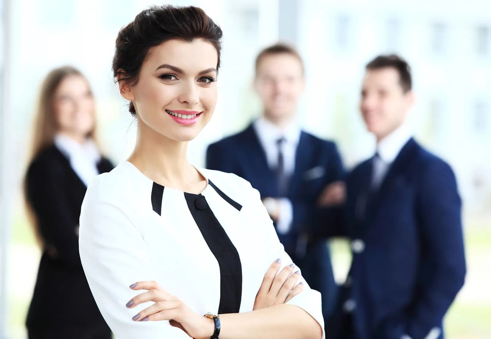 smiling woman in business attire, compliance and drills hero
